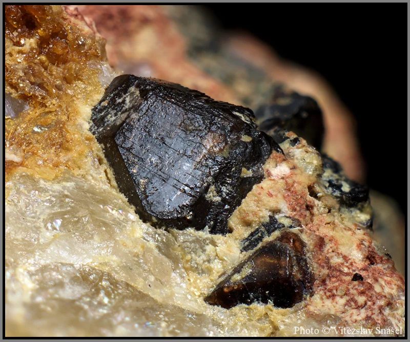 Mineral photo of Cassiterite from locality Hubský peň, Horní Slavkov, Czech Republic