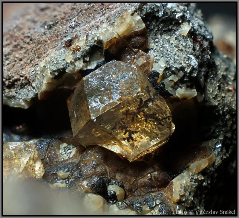 Mineral photo of Paulingite-(Ca) from locality Vinařice, Czech Republic