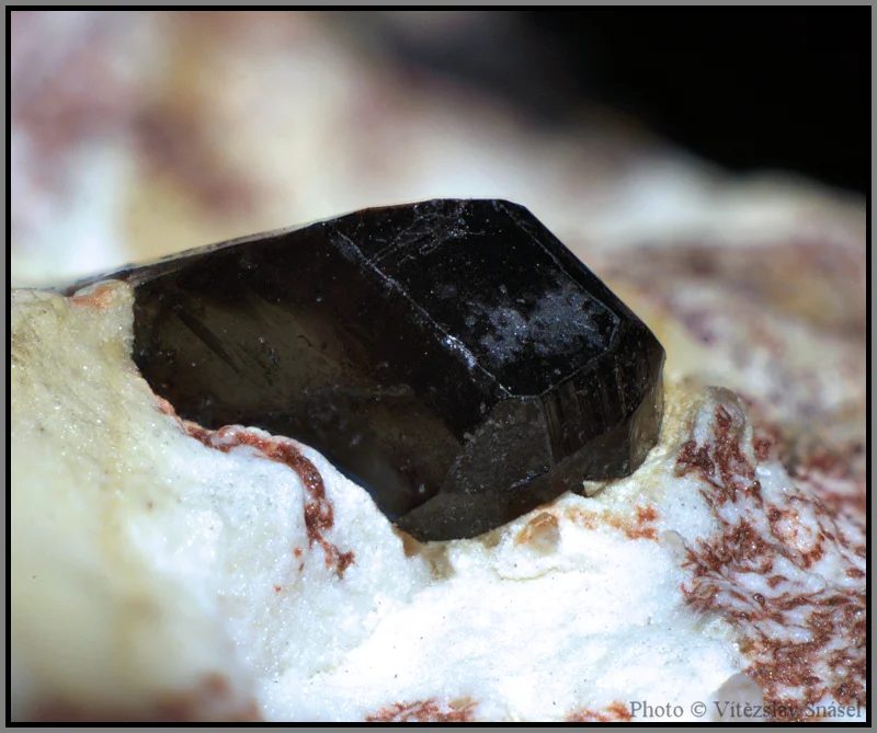 Mineral photo of Cassiterite from locality Hubský peň, Horní Slavkov, Czech Republic