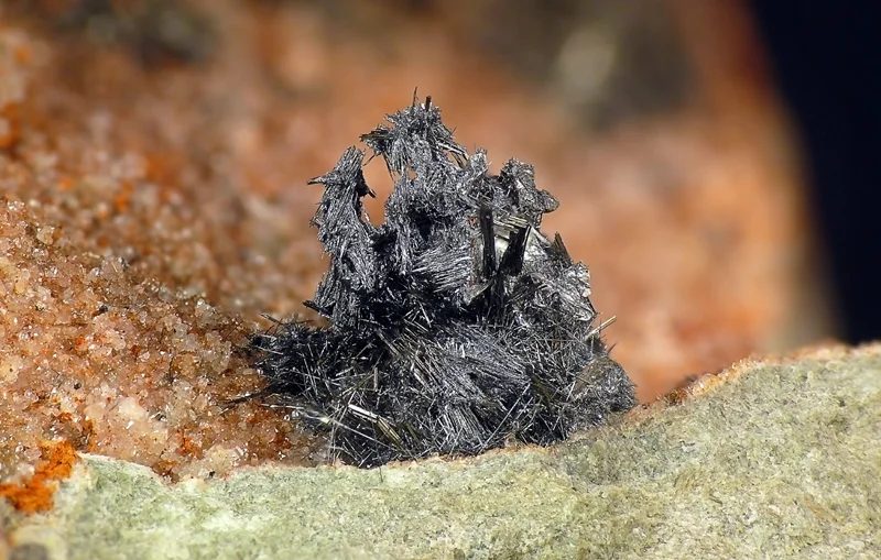 Mineral photo of Bismuth, Bismuthinite from locality Krupka, štola Barbora, Czech Republic